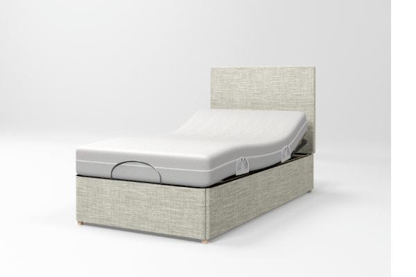 Mattress on a adjustable bed frame with a white background