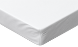 A close-up of a white fitted sheet covering the corner of a mattress, showing the clean fabric and stitched edge against a white background.